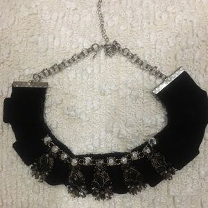 Velour bib necklace with beautiful stone accent.